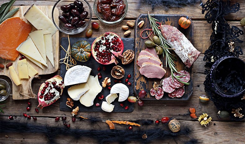  assortment of delicious fall inspired cheeses and meats