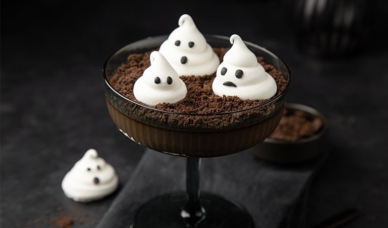  photo of row of Halloween chocolate cupcakes in martini glass